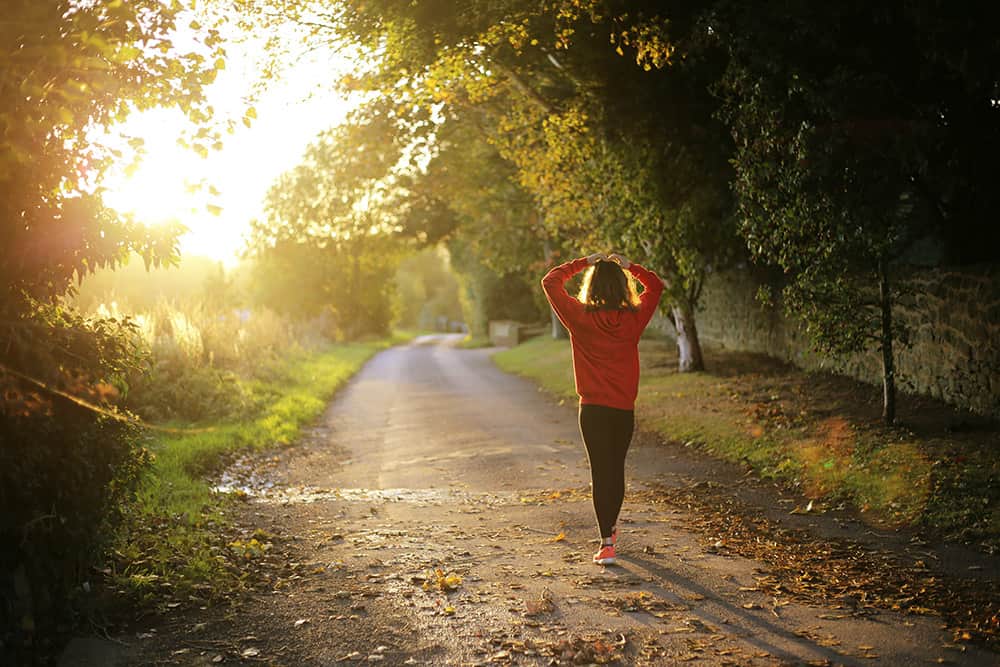 Indigenous woman on a walk, living a healthy lifestyle 